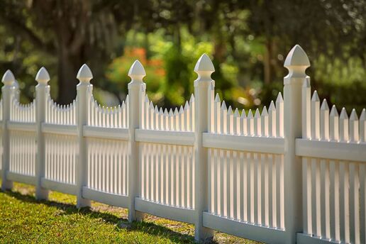 White vinyl picket fence